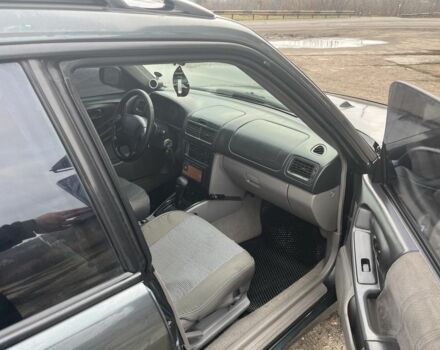 Серый Субару Форестер, объемом двигателя 2 л и пробегом 350 тыс. км за 4500 $, фото 12 на Automoto.ua