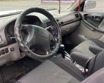 Серый Субару Форестер, объемом двигателя 2 л и пробегом 325 тыс. км за 4400 $, фото 2 на Automoto.ua