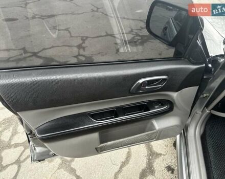 Серый Субару Форестер, объемом двигателя 2 л и пробегом 370 тыс. км за 4000 $, фото 7 на Automoto.ua