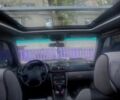Зелений Субару Forester, об'ємом двигуна 2 л та пробігом 335 тис. км за 1799 $, фото 2 на Automoto.ua