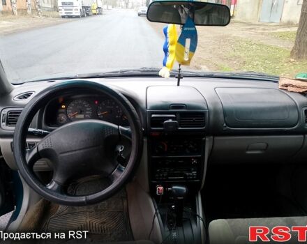 Зелений Субару Forester, об'ємом двигуна 2 л та пробігом 300 тис. км за 4450 $, фото 7 на Automoto.ua