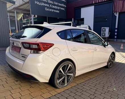 Белый Субару Импреза, объемом двигателя 2 л и пробегом 84 тыс. км за 12500 $, фото 6 на Automoto.ua