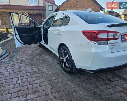 Белый Субару Импреза, объемом двигателя 2 л и пробегом 56 тыс. км за 13800 $, фото 16 на Automoto.ua