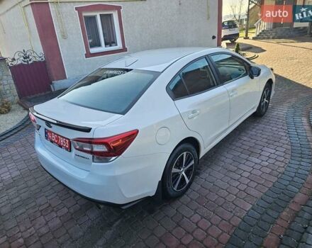 Белый Субару Импреза, объемом двигателя 2 л и пробегом 56 тыс. км за 13800 $, фото 7 на Automoto.ua