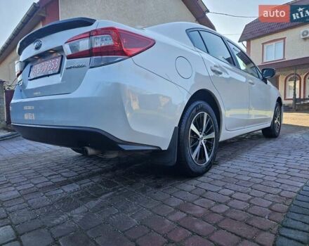 Белый Субару Импреза, объемом двигателя 2 л и пробегом 56 тыс. км за 13800 $, фото 9 на Automoto.ua