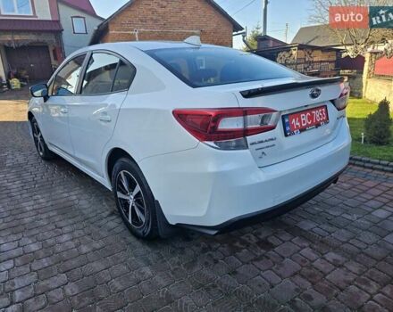 Белый Субару Импреза, объемом двигателя 2 л и пробегом 56 тыс. км за 13800 $, фото 12 на Automoto.ua