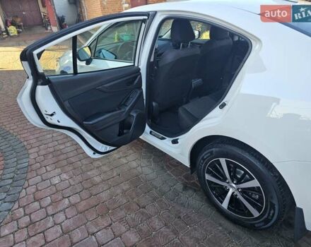 Белый Субару Импреза, объемом двигателя 2 л и пробегом 56 тыс. км за 13800 $, фото 21 на Automoto.ua