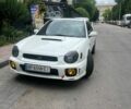 Белый Субару Импреза, объемом двигателя 2 л и пробегом 170 тыс. км за 7500 $, фото 1 на Automoto.ua
