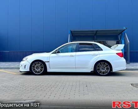 Белый Субару Импреза, объемом двигателя 2.5 л и пробегом 142 тыс. км за 16000 $, фото 1 на Automoto.ua