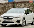Белый Субару Импреза, объемом двигателя 2 л и пробегом 157 тыс. км за 7700 $, фото 1 на Automoto.ua