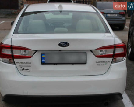 Белый Субару Импреза, объемом двигателя 2 л и пробегом 107 тыс. км за 11000 $, фото 2 на Automoto.ua