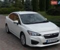 Белый Субару Импреза, объемом двигателя 2 л и пробегом 115 тыс. км за 8500 $, фото 1 на Automoto.ua