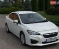 Белый Субару Импреза, объемом двигателя 2 л и пробегом 115 тыс. км за 9400 $, фото 1 на Automoto.ua