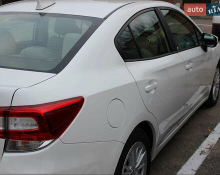 Белый Субару Импреза, объемом двигателя 2 л и пробегом 107 тыс. км за 11000 $, фото 1 на Automoto.ua