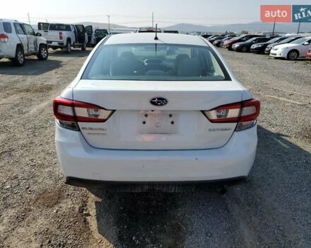 Белый Субару Импреза, объемом двигателя 2 л и пробегом 74 тыс. км за 2400 $, фото 5 на Automoto.ua