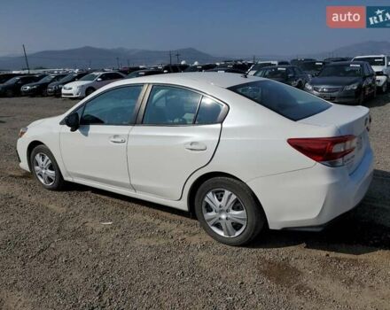 Белый Субару Импреза, объемом двигателя 2 л и пробегом 74 тыс. км за 2400 $, фото 1 на Automoto.ua