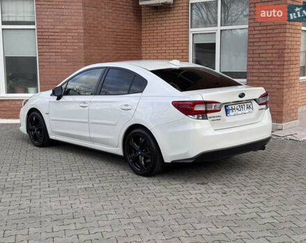 Белый Субару Импреза, объемом двигателя 2 л и пробегом 128 тыс. км за 12960 $, фото 4 на Automoto.ua