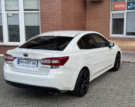 Белый Субару Импреза, объемом двигателя 2 л и пробегом 128 тыс. км за 12960 $, фото 7 на Automoto.ua