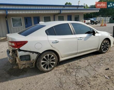 Белый Субару Импреза, объемом двигателя 2 л и пробегом 81 тыс. км за 2400 $, фото 2 на Automoto.ua