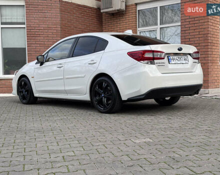 Белый Субару Импреза, объемом двигателя 2 л и пробегом 128 тыс. км за 12960 $, фото 5 на Automoto.ua