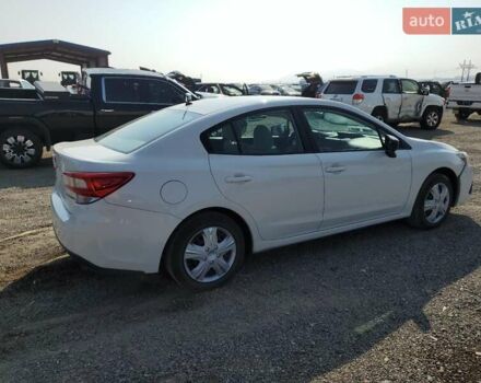 Белый Субару Импреза, объемом двигателя 2 л и пробегом 74 тыс. км за 2400 $, фото 2 на Automoto.ua