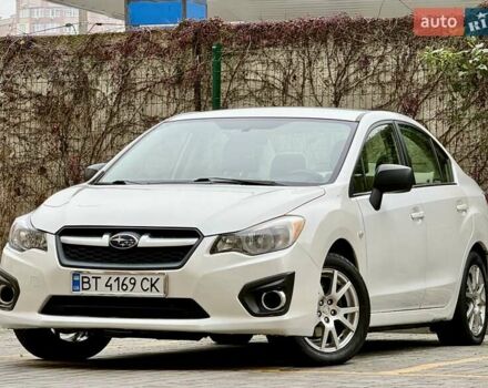 Белый Субару Импреза, объемом двигателя 2 л и пробегом 157 тыс. км за 7700 $, фото 1 на Automoto.ua