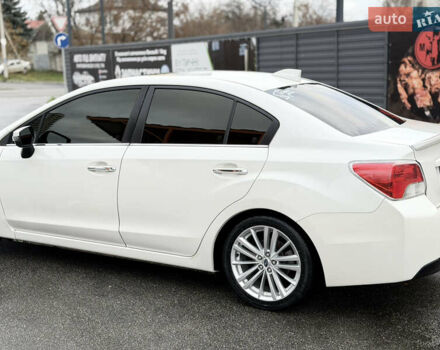 Белый Субару Импреза, объемом двигателя 2 л и пробегом 105 тыс. км за 10000 $, фото 1 на Automoto.ua