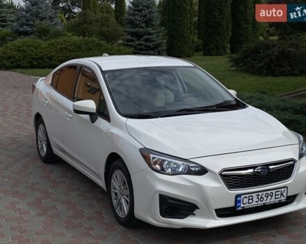 Белый Субару Импреза, объемом двигателя 2 л и пробегом 115 тыс. км за 8500 $, фото 1 на Automoto.ua