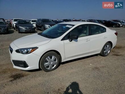 Белый Субару Импреза, объемом двигателя 2 л и пробегом 74 тыс. км за 2400 $, фото 1 на Automoto.ua