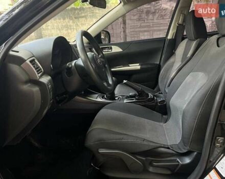 Черный Субару Импреза, объемом двигателя 1.99 л и пробегом 209 тыс. км за 7699 $, фото 5 на Automoto.ua