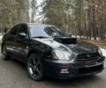 Черный Субару Импреза, объемом двигателя 1.6 л и пробегом 270 тыс. км за 5500 $, фото 1 на Automoto.ua