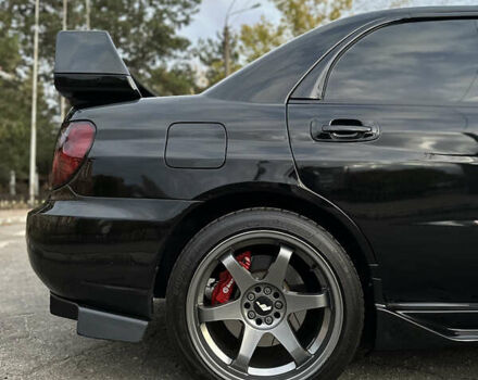 Субару Импреза 2004 в Николаеве на Automoto.ua Черный Субару Импреза, объемом двигателя 1.99 л и пробегом 225 тыс. км за 14300 $, фото 10 на Automoto.ua