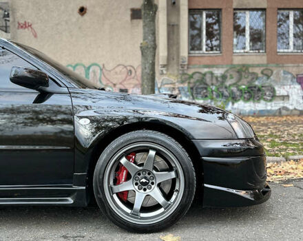 Субару Импреза 2004 в Николаеве на Automoto.ua Черный Субару Импреза, объемом двигателя 1.99 л и пробегом 225 тыс. км за 14300 $, фото 4 на Automoto.ua