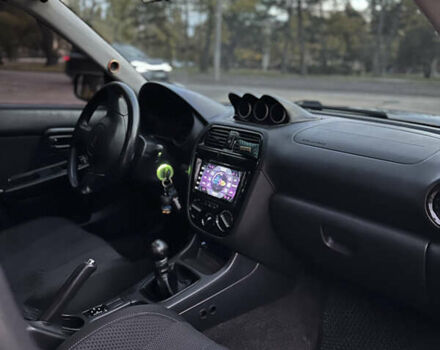 Субару Импреза 2004 в Николаеве на Automoto.ua Черный Субару Импреза, объемом двигателя 1.99 л и пробегом 225 тыс. км за 14300 $, фото 13 на Automoto.ua