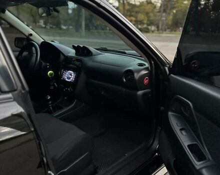 Субару Импреза 2004 в Николаеве на Automoto.ua Черный Субару Импреза, объемом двигателя 1.99 л и пробегом 225 тыс. км за 14300 $, фото 14 на Automoto.ua