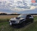 Черный Субару Импреза, объемом двигателя 2.46 л и пробегом 132 тыс. км за 16999 $, фото 1 на Automoto.ua