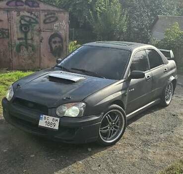 Черный Субару Импреза, объемом двигателя 1.99 л и пробегом 340 тыс. км за 6500 $, фото 1 на Automoto.ua