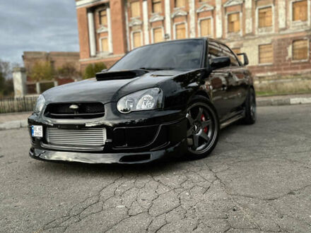 Черный Субару Импреза, объемом двигателя 1.99 л и пробегом 225 тыс. км за 14300 $, фото 1 на Automoto.ua