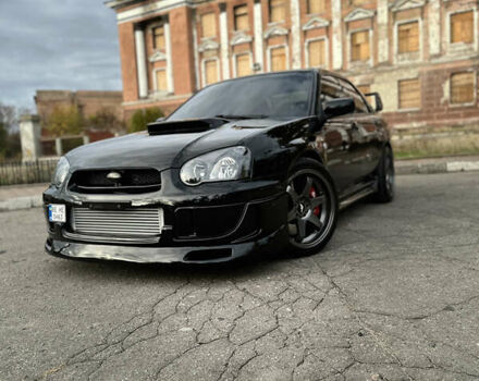 Черный Субару Импреза, объемом двигателя 1.99 л и пробегом 225 тыс. км за 14300 $, фото 1 на Automoto.ua