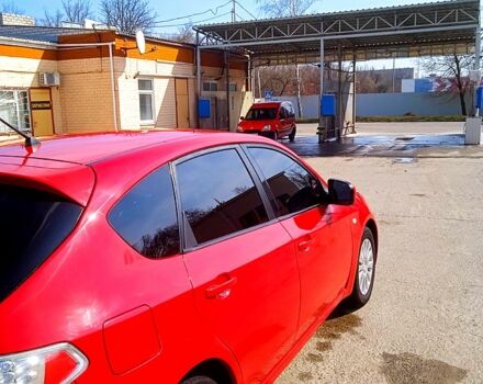 Красный Субару Импреза, объемом двигателя 2 л и пробегом 157 тыс. км за 7000 $, фото 4 на Automoto.ua