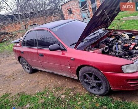 Красный Субару Импреза, объемом двигателя 1.6 л и пробегом 150 тыс. км за 2600 $, фото 1 на Automoto.ua