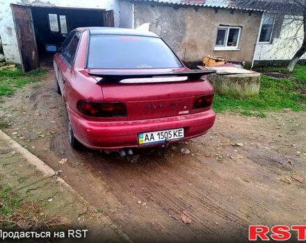 Красный Субару Импреза, объемом двигателя 1.6 л и пробегом 150 тыс. км за 2600 $, фото 1 на Automoto.ua