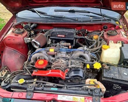 Красный Субару Импреза, объемом двигателя 1.6 л и пробегом 150 тыс. км за 2600 $, фото 2 на Automoto.ua