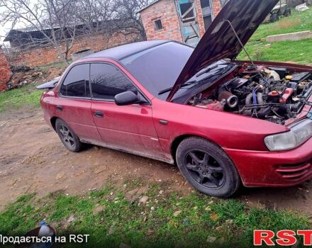 Красный Субару Импреза, объемом двигателя 1.6 л и пробегом 150 тыс. км за 2600 $, фото 2 на Automoto.ua