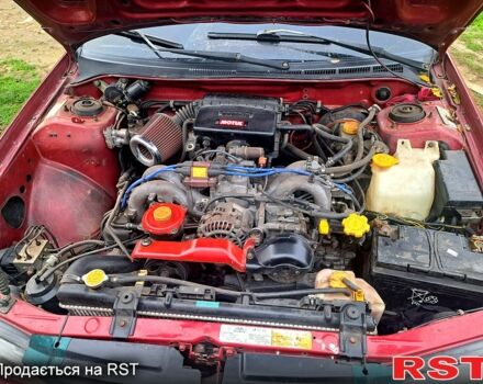 Красный Субару Импреза, объемом двигателя 1.6 л и пробегом 150 тыс. км за 2600 $, фото 3 на Automoto.ua