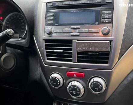 Субару Импреза 2008 в Киеве на Automoto.ua Красный Субару Импреза, объемом двигателя 2 л и пробегом 322 тыс. км за 7490 $, фото 23 на Automoto.ua