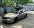 Желтый Субару Импреза, объемом двигателя 1.5 л и пробегом 288 тыс. км за 4500 $, фото 1 на Automoto.ua