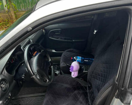 Серый Субару Импреза, объемом двигателя 1.6 л и пробегом 200 тыс. км за 6600 $, фото 9 на Automoto.ua