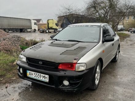 Серый Субару Импреза, объемом двигателя 2 л и пробегом 300 тыс. км за 1500 $, фото 1 на Automoto.ua