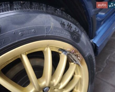 Синий Субару Импреза, объемом двигателя 1.99 л и пробегом 350 тыс. км за 4000 $, фото 1 на Automoto.ua